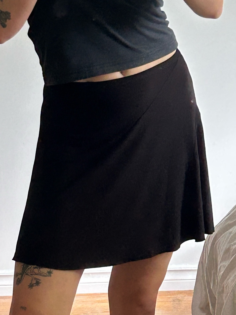 VINTAGE black stretch mini skirt